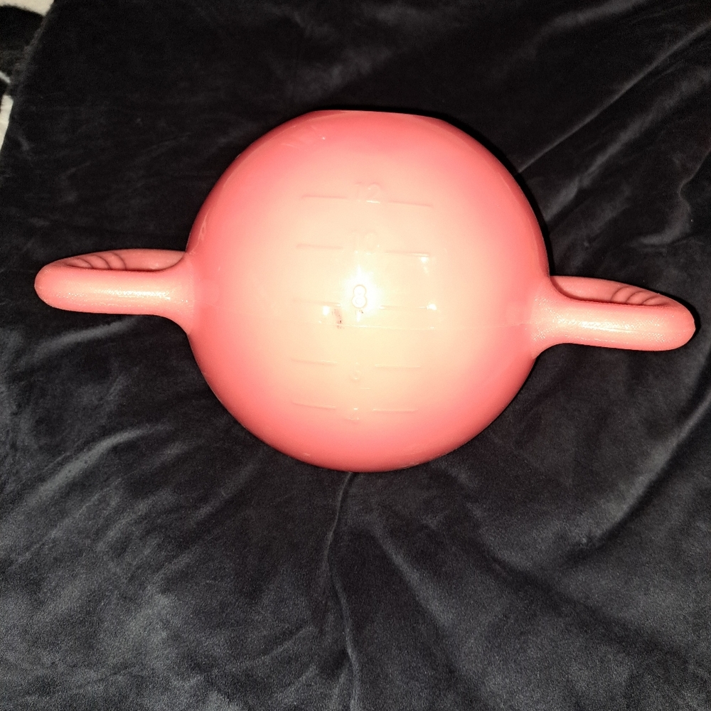 New in box never opened dual sided kettle ball. Fillable to 10 Lbs.